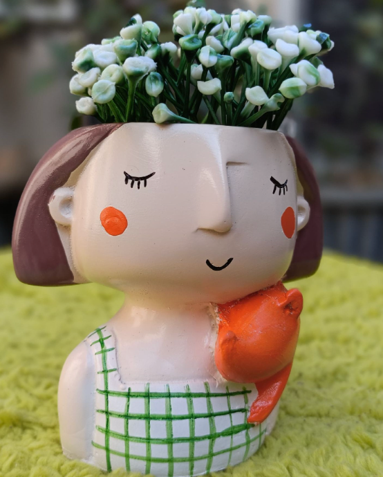 SET OF 4 GIRL PLANTERS