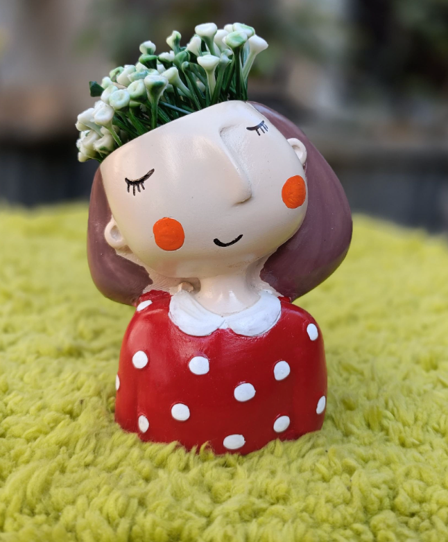 SET OF 4 GIRL PLANTERS