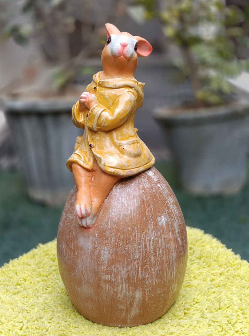 Cute Hoodie Bunny sitting on Egg